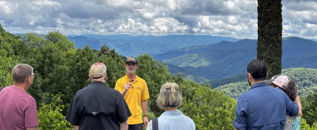 Luke Wayne Teaching Smoky Mountains Group Tour Luke Wayne of Canyon Ministries teaching a tour group before panoramic ridges in Great Smoky Mountains National Park